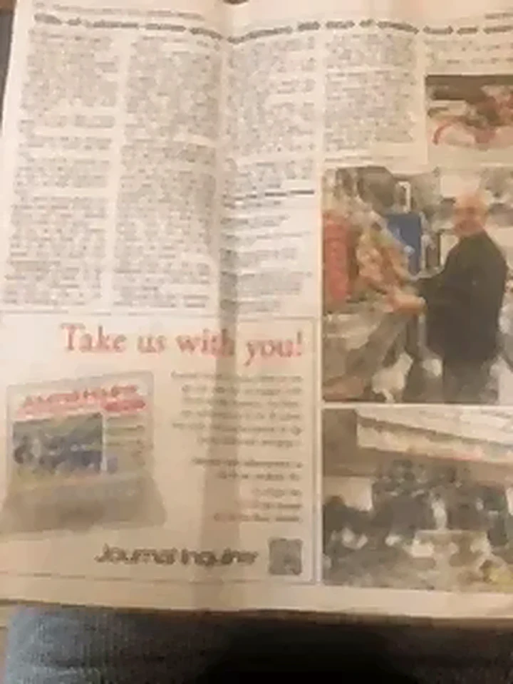 Open newspaper with an article about Villa of Lebanon